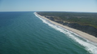 AX144_018 - 5.5K aerial stock footage flying by waves crashing, beaches, Cape Cod, Truro, Massachusetts