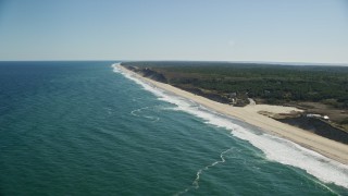 AX144_020 - 5.5K aerial stock footage flying by waves crashing, beaches, Cape Cod, Truro, Massachusetts