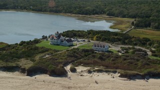 AX144_031E - 5.5K aerial stock footage panning right by Coast Guard Beach, Cape Cod, Eastham, Massachusetts
