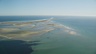AX144_056E - 5.5K aerial stock footage flying by sand bars at low tide and Monomoy Island, Massachusetts