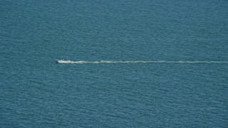 AX144_073 - 5.5K aerial stock footage tracking a speedboat on the Atlantic, Nantucket, Massachusetts