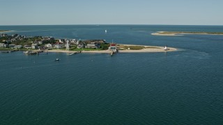 AX144_081 - 5.5K aerial stock footage of oceanfront property, Nantucket Harbor Range Lights, Nantucket, Massachusetts