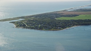 AX144_128 - 5.5K stock footage aerial video flying by coastal community, Edgartown, Martha's Vineyard, Massachusetts