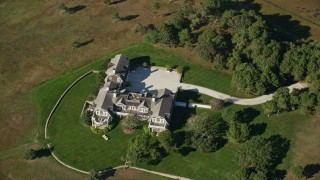 AX144_129 - 5.5K stock footage aerial video of a bird's eye view, isolated mansion, Chappaquiddick Island, Martha's Vineyard, Massachusetts