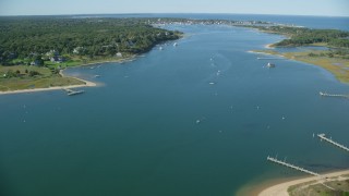 AX144_130 - 5.5K stock footage aerial video flying over Katama Bay, Edgartown, Martha's Vineyard, Massachusetts