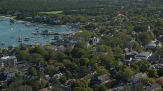 AX144_143E - 5.5K aerial stock footage flying by small coastal town, Edgartown, Martha's Vineyard, Massachusetts