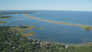 AX144_147 - 5.5K stock footage aerial video of Sengekontacket Pond, homes, Edgartown, Martha's Vineyard, Massachusetts
