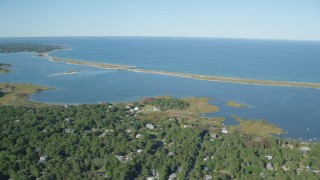 AX144_148 - 5.5K stock footage aerial video of waterfront homes near pond, Edgartown, Martha's Vineyard, Massachusetts
