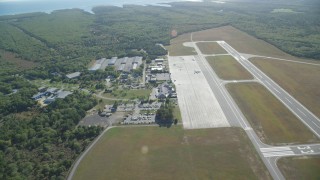 AX144_152 - 5.5K stock footage aerial video flying over Martha's Vineyard Airport, West Tisbury, Massachusetts