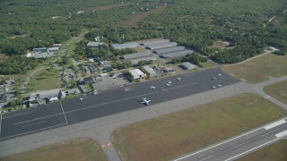 AX144_153 - 5.5K aerial stock footage flying by Martha's Vineyard Airport, West Tisbury, Massachusetts