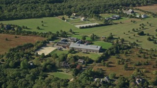 AX144_154 - 5.5K aerial stock footage flying by mansion, West Tisbury, Martha's Vineyard, Massachusetts