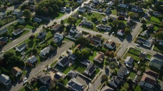 AX144_206 - 6k aerial stock footage flying over suburban neighborhoods, New Bedford, Massachusetts