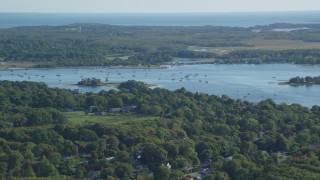 AX144_207 - 6k aerial stock footage flying by Apponagansett Bay, Dartmouth, Massachusetts