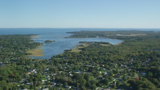 AX144_209 - 6k aerial stock footage flying by Apponagansett Bay, Dartmouth, Massachusetts