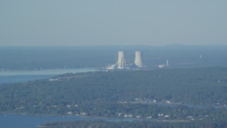 AX144_222 - 6k aerial stock footage flying by Dynegy Brayton Point coal-fired power plant, Somerset, Massachusetts