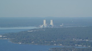 AX144_223 - 6k aerial stock footage flying by Dynegy Brayton Point coal-fired power plant, Somerset, Massachusetts