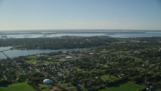 AX144_224E - 6k aerial stock footage approaching coastal community, Middletown, Rhode Island