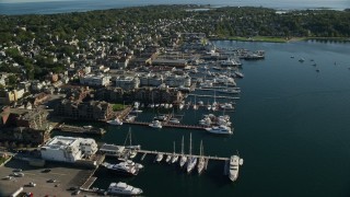 AX144_239 - 6k aerial stock footage of waterfront hotels, marina, coastal community, Newport, Rhode Island