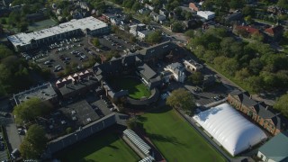 AX144_243 - 6k stock footage aerial video orbiting International Tennis Hall of Fame, Newport Casino, Newport, Rhode Island