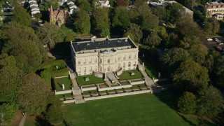 AX144_245 - 6k aerial stock footage flying by The Elms, a historic mansion, Newport, Rhode Island