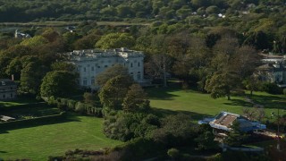 AX144_255 - 6k aerial stock footage flying by Marble House, a mansion that is now a museum, Newport, Rhode Island