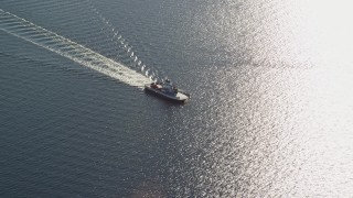 AX145_011 - 6k aerial stock footage flying by a car ferry, Portsmouth, Rhode Island