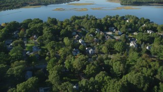 AX145_022 - 6k aerial stock footage flying over neighborhood, approach Hundred Acre Cove, Barrington, Rhode Island