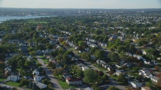 AX145_028 - 6k stock footage aerial video flying over suburban neighborhoods, East Providence, Rhode Island