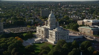 AX145_038E - 6k aerial stock footage flying by the Rhode Island State House, Providence, Rhode Island