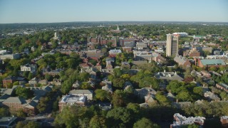 AX145_062 - 6k stock footage aerial video flying by Brown University, colorful trees, Providence, Rhode Island