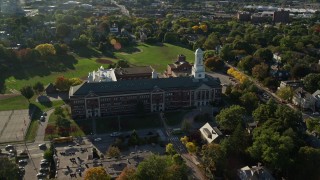 AX145_067 - 6k aerial stock footage approaching Hope High School, tilt down, Providence, Rhode Island