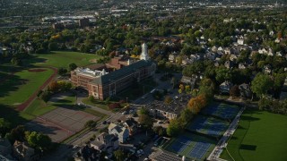 AX145_074 - 6k aerial stock footage approaching Hope High School and tilt down, Providence, Rhode Island