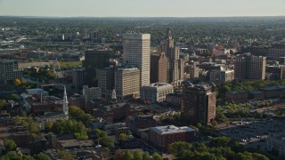 AX145_075E - 6k aerial stock footage flying by buildings and skyscrapers, Downtown Providence, Rhode Island