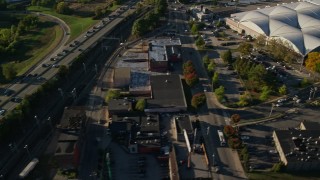AX145_089 - 6k aerial stock footage flying by interchange, reveal US Post Office warehouse, Providence, Rhode Island