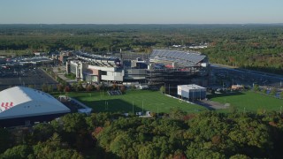 AX145_117 - 6k stock footage aerial video approaching Gillette Stadium, autumn, Foxborough, Massachusetts