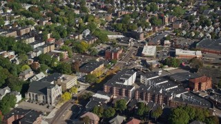 AX147_003 - 6K aerial stock footage flying over a city street and apartment buildings, Dorchester, Massachusetts