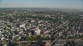 AX147_010E - 6K aerial stock footage flying over residential area and Chelsea River toward hospital, Chelsea, Massachusetts
