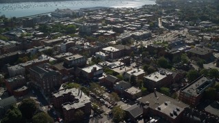 AX147_038E - 6K aerial stock footage flying over office buildings near a harbor, Salem, Massachusetts