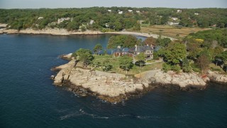 AX147_076E - 6K aerial stock footage approaching an oceanfront mansion, Manchester-by-the-Sea, Massachusetts