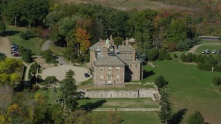 AX147_142 - 6k aerial stock footage orbiting The Great House at Crane Estate and Castle Hill in autumn, Ipswich, Massachusetts