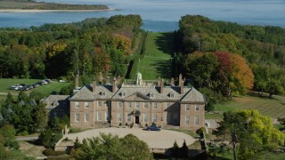AX147_149 - 6k aerial stock footage flying over The Great House at Crane Estate, Castle Hill, autumn, Ipswich, Massachusetts