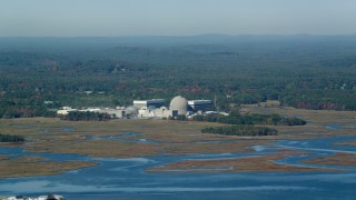 AX147_153 - 6k aerial stock footage passing a nuclear power station in autumn, Seabrook, New Hampshire