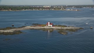 AX147_197 - 6k aerial stock footage of an isolated home on an island, Kittery, Maine