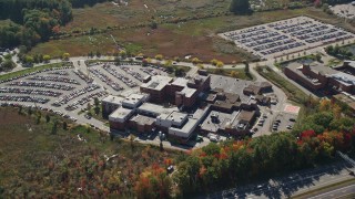 AX147_208 - 6k aerial stock footage flying by Portsmouth Regional Hospital, autumn, Portsmouth, New Hampshire
