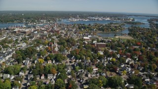 AX147_219E - 6K aerial stock footage flying over coastal town, autumn, Portsmouth, New Hampshire