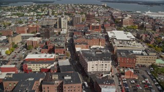 AX147_337E - 6K aerial stock footage flying over The Westin Portland Harbourview, downtown, Portland, Maine