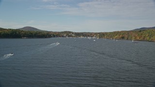 AX148_093 - 6K aerial stock footage flying low over Rockport Harbor, approach small coastal town, autumn, Rockport, Maine