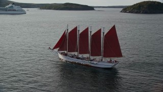 AX148_197 - 5.5K aerial stock footage tracking a sailing ship in Bar Harbor, Maine