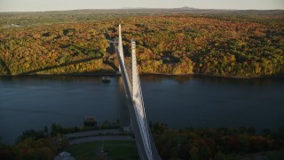 AX149_115 - 5.5K aerial stock footage flying by Penobscot Narrows Bridge, Penobscot River, autumn, Maine