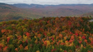 AX150_168 - 5.5K aerial stock footage approaching colorful forests, White Mountains, New Hampshire